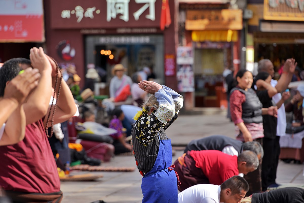 Believers in front of Jokhang Temple