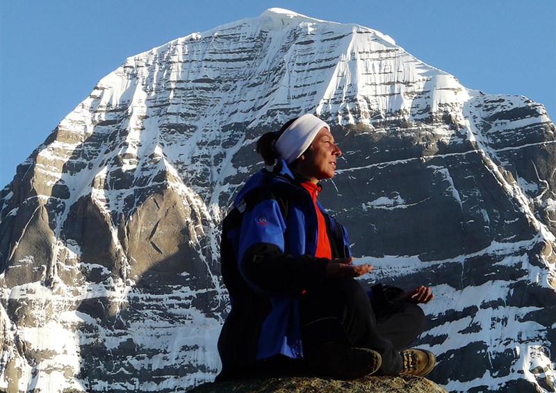 Pilgrim in front of the Holy Mountain Kailash